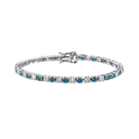 A tennis bracelet featuring round-cut blue sapphires and clear diamonds set in a silver-colored metal, shown against a plain white background.